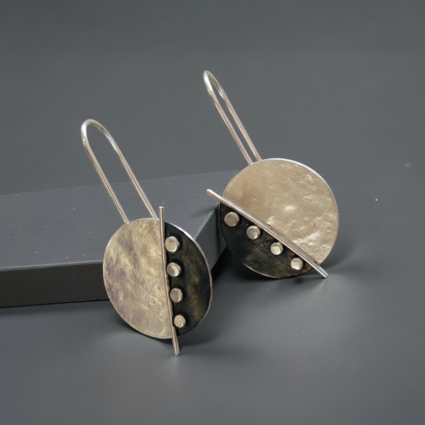 Large sterling silver disc earrings.