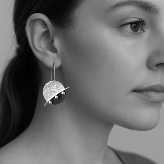 Sterling silver textured disc earrings