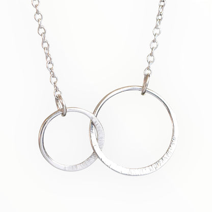 Sterling silver infinity necklace.