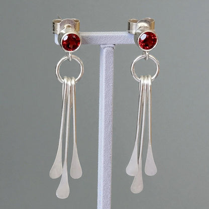 Garnet sterling silver dangle stud earrings.