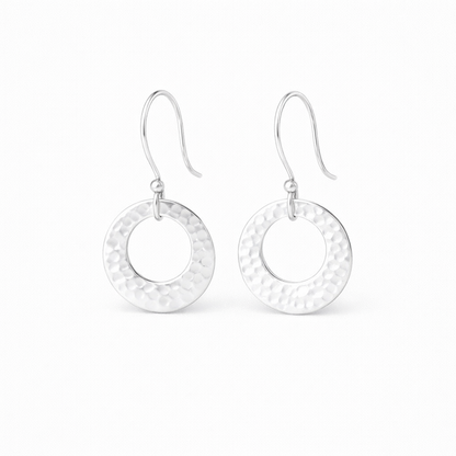 Hammered circle sterling silver earrings.
