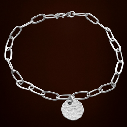 Sterling silver disc charm cable chain bracelet.
