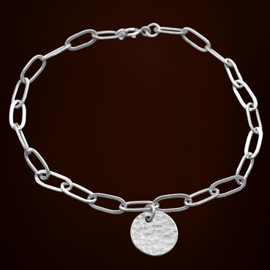 Sterling silver disc charm cable chain bracelet.