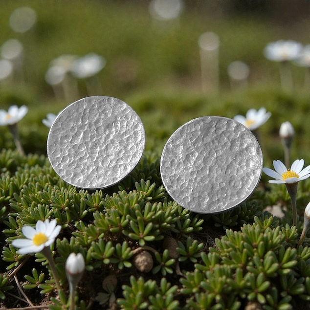 Minimalist sterling silver hammered disc stud earrings.