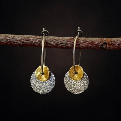 Oxidised sterling silver disc earrings.