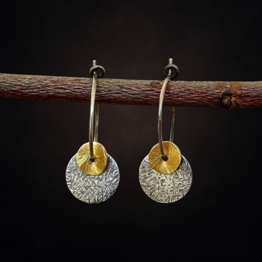 Oxidised sterling silver disc earrings.