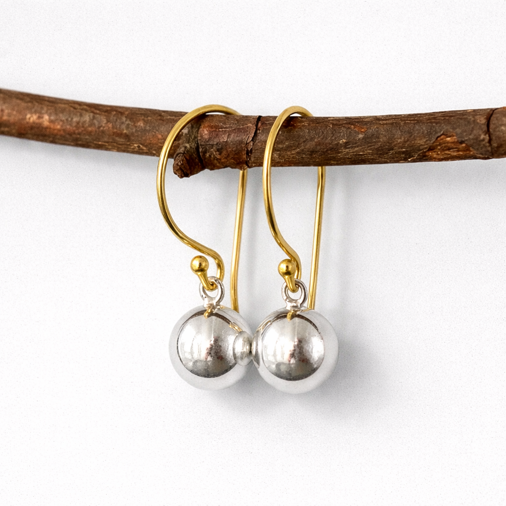 Gold and silver ball dangle earrings