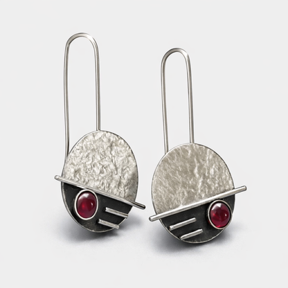 Sterling silver garnet earrings.