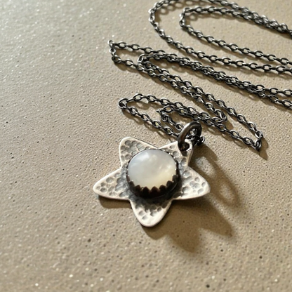 Mother of Pearl, star oxidised sterling silver necklace.