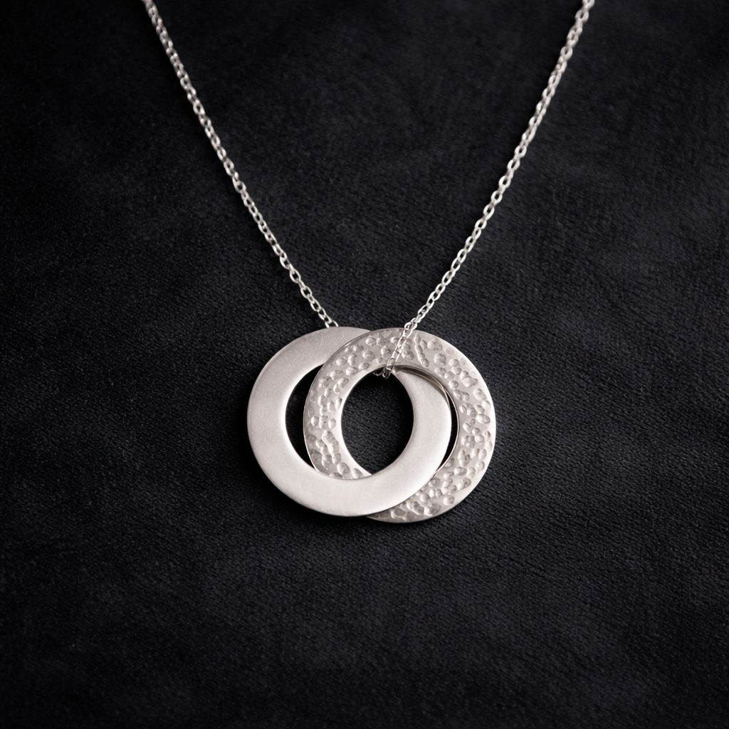 Sterling silver interlocking circle necklace.