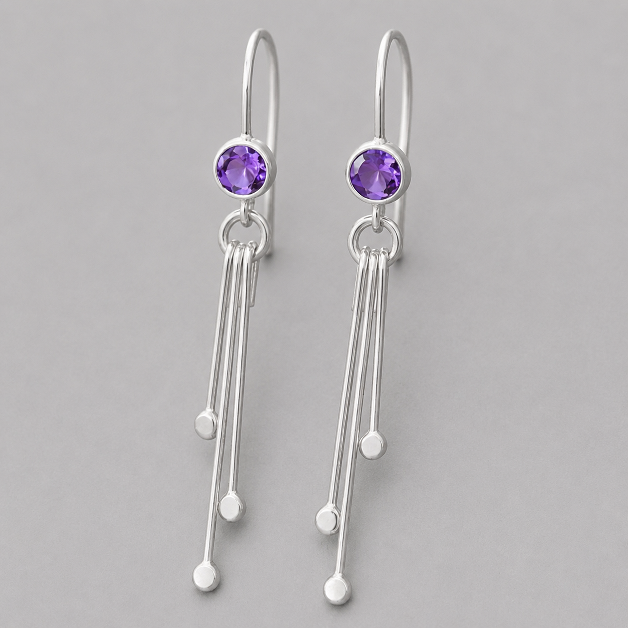 Amethyst birthstone sterling silver dangle earrings.