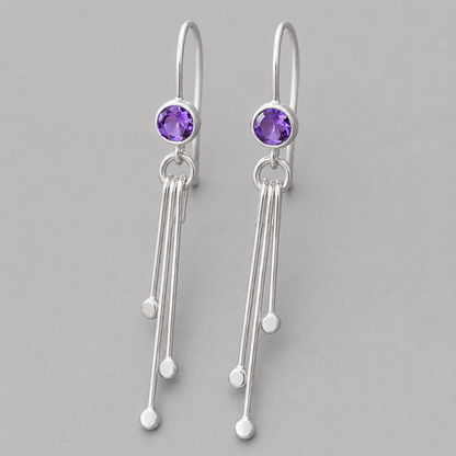 Amethyst birthstone sterling silver dangle earrings.