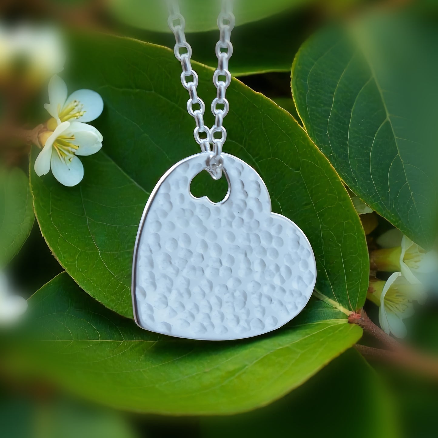 Hammered sterling silver heart necklace pendant.