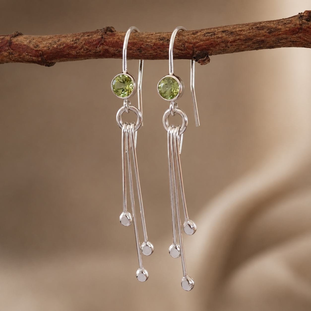 Peridot birthstone sterling silver dangle earrings.
