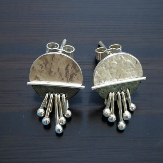 Dangle sterling silver disc stud earrings.