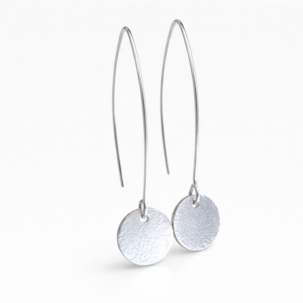 Long sterling silver hammered disc earrings