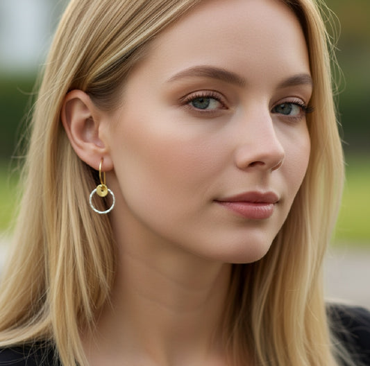 Sterling silver twisted circle earrings.