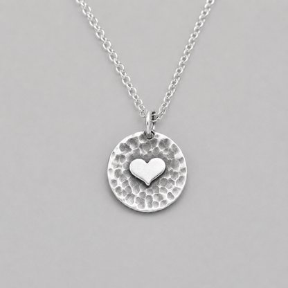 Sterling silver heart disc pendant