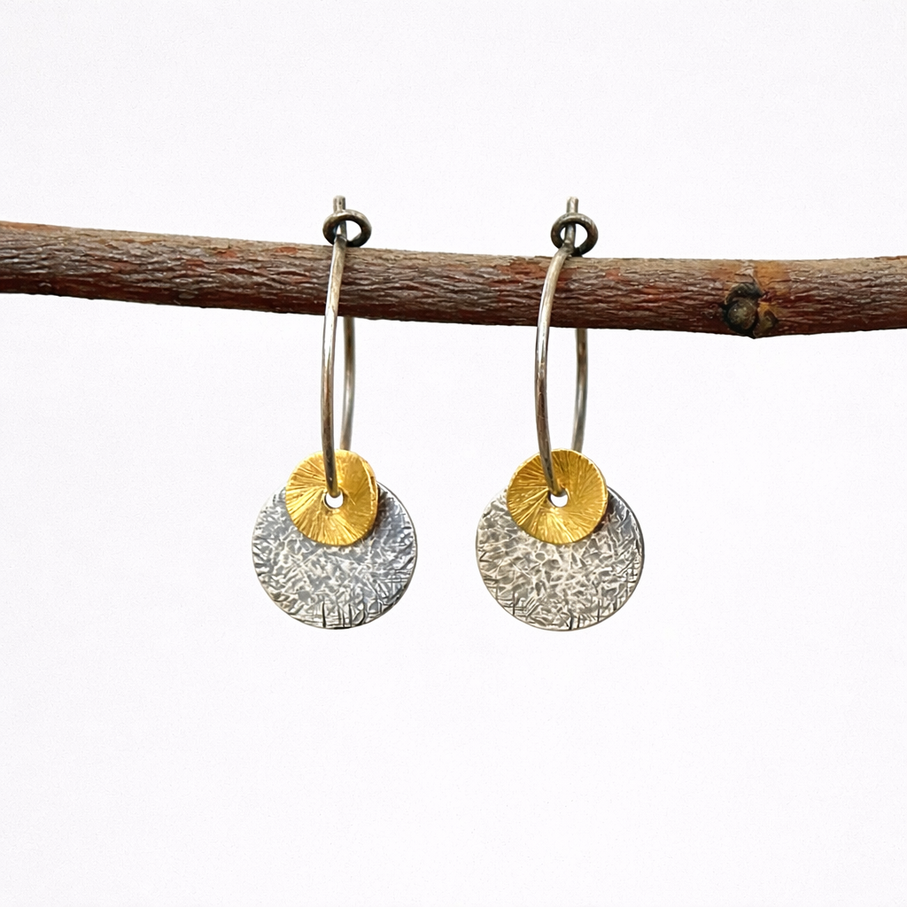 Oxidised sterling silver disc earrings.