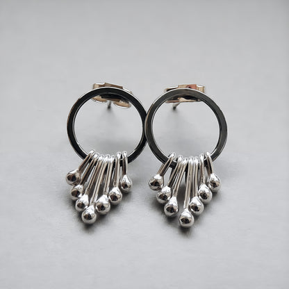Sterling silver oxidised circle dangle studs.