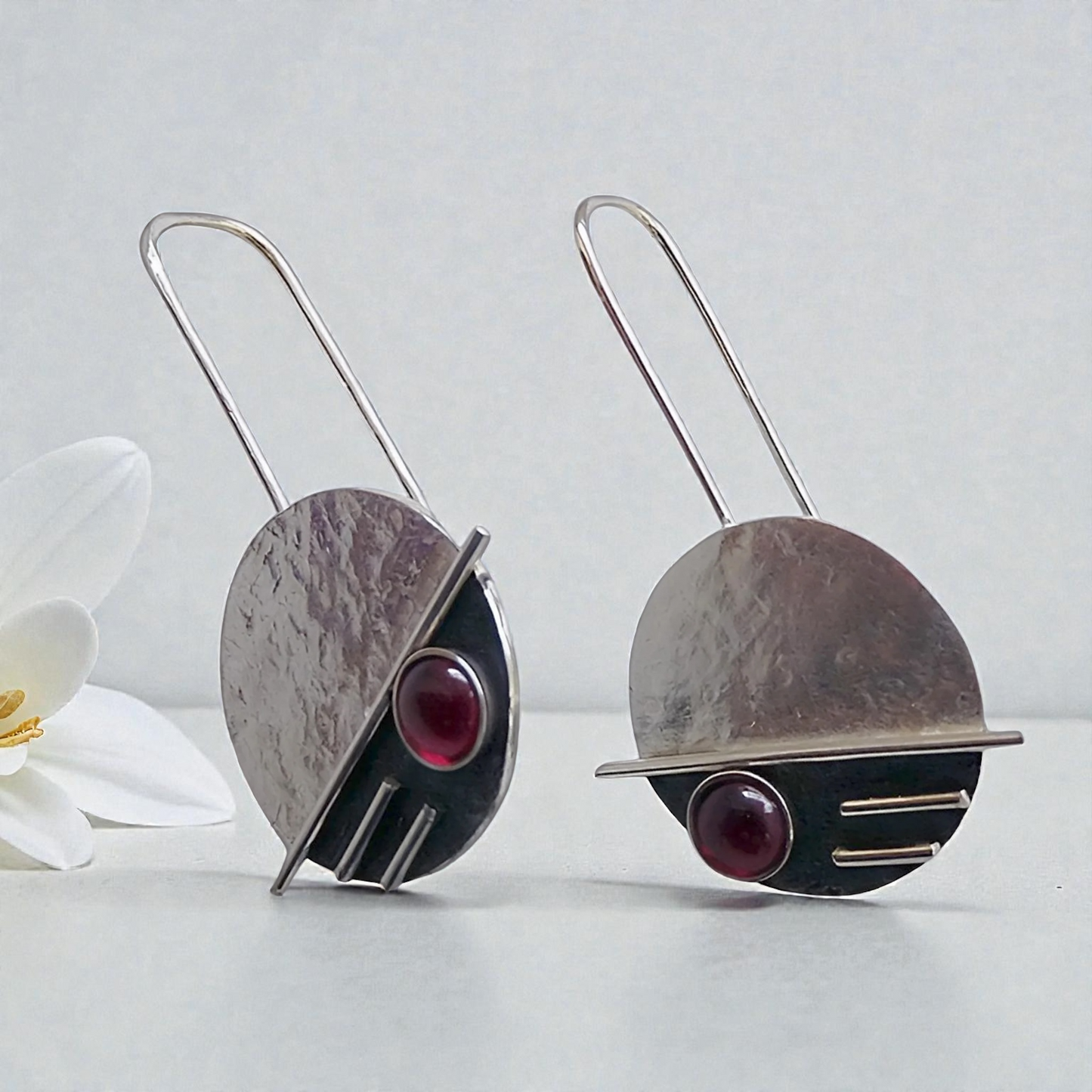 Sterling silver garnet earrings.