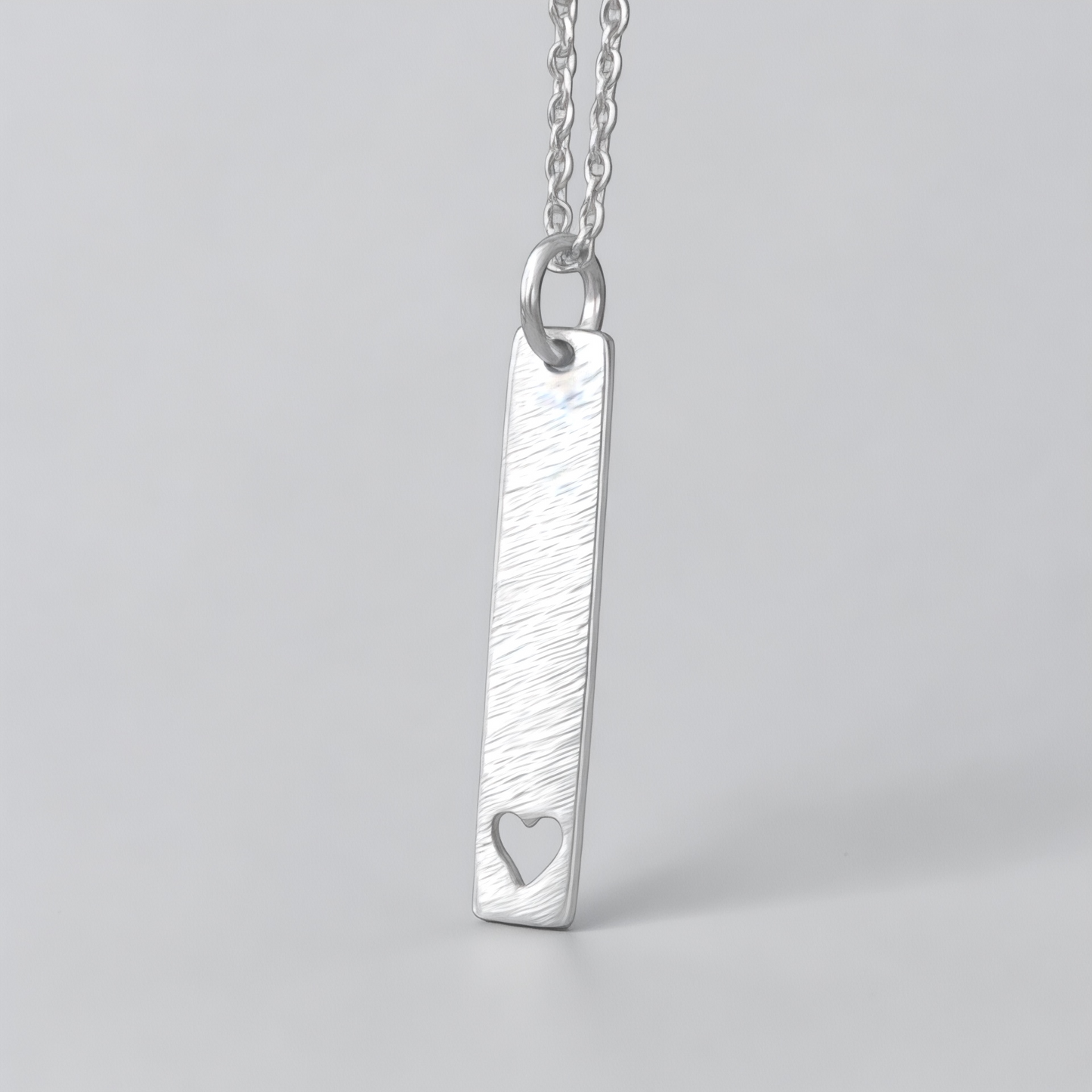 Hammered heart sterling silver rectangular necklace.