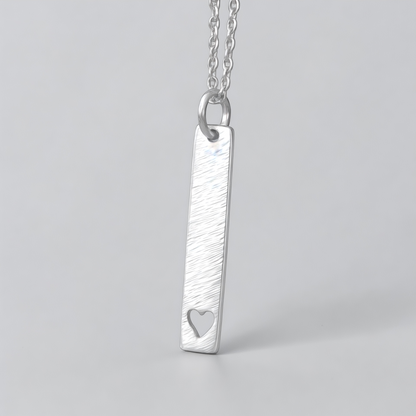 Hammered heart sterling silver rectangular necklace.