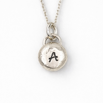 Pebble solid sterling silver personalised letter necklace.