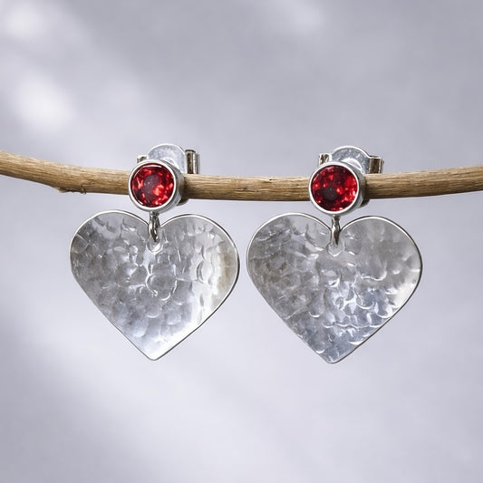 Garnet January birthstone sterling silver heart stud earrings.