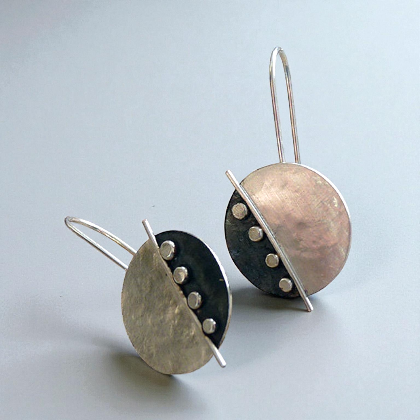 Large sterling silver disc earrings.