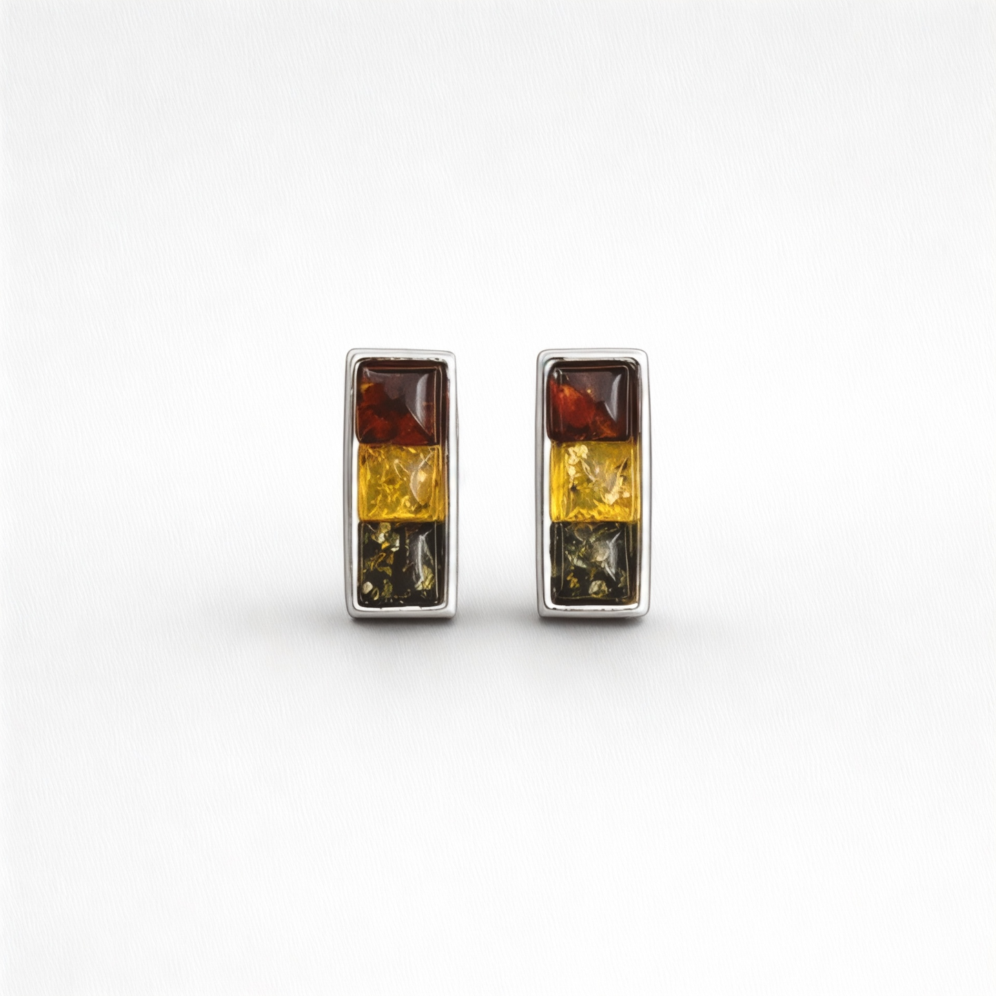 Sterling Silver Stud Earrings with a Trio of Amber Stones
