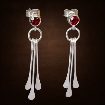 Garnet sterling silver dangle stud earrings.