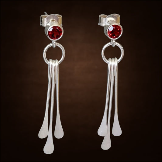 Garnet sterling silver dangle stud earrings.