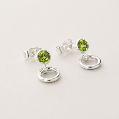 Peridot and circle sterling silver stud earrings.