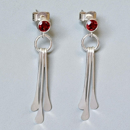 Garnet sterling silver dangle stud earrings.