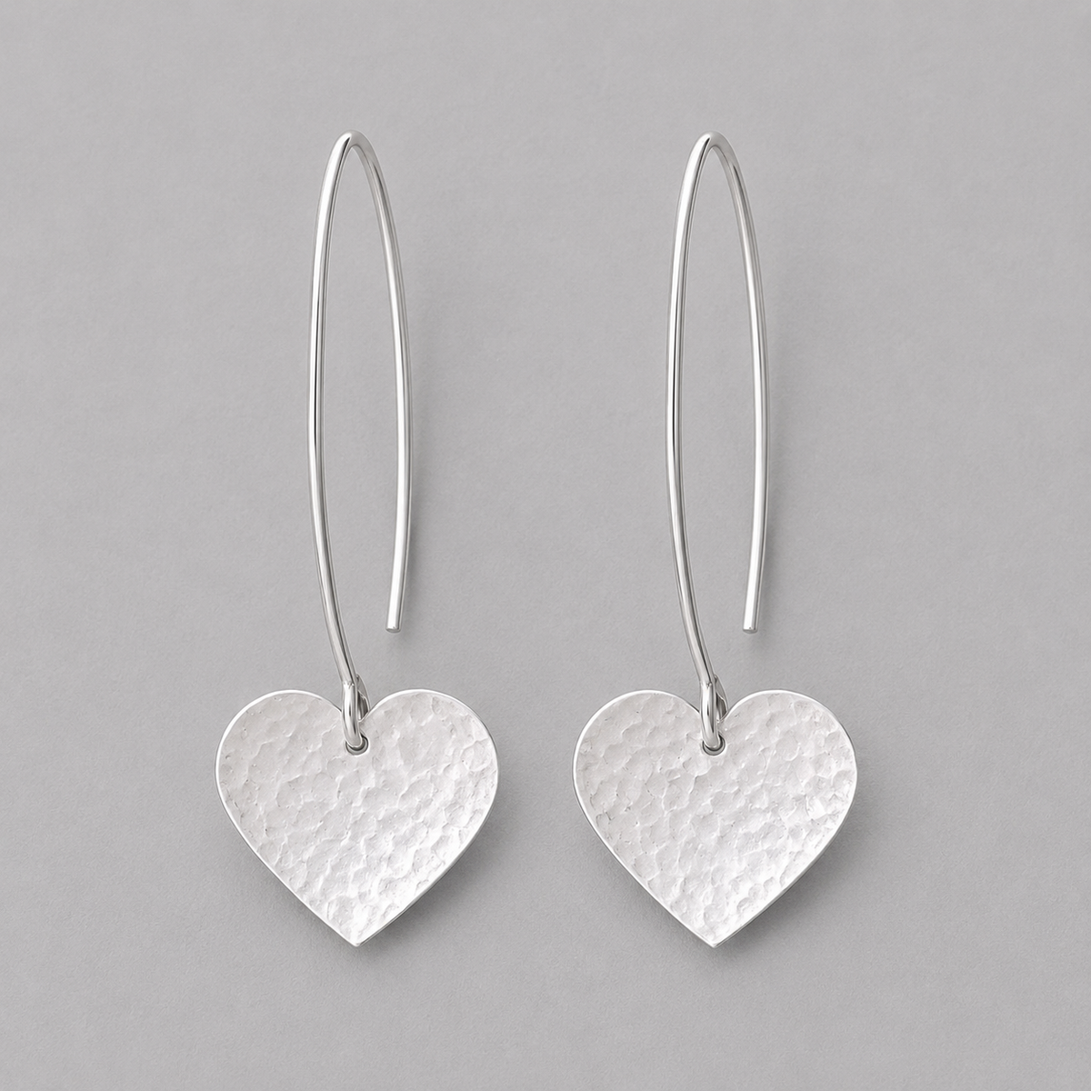 Sterling silver dangle heart earrings