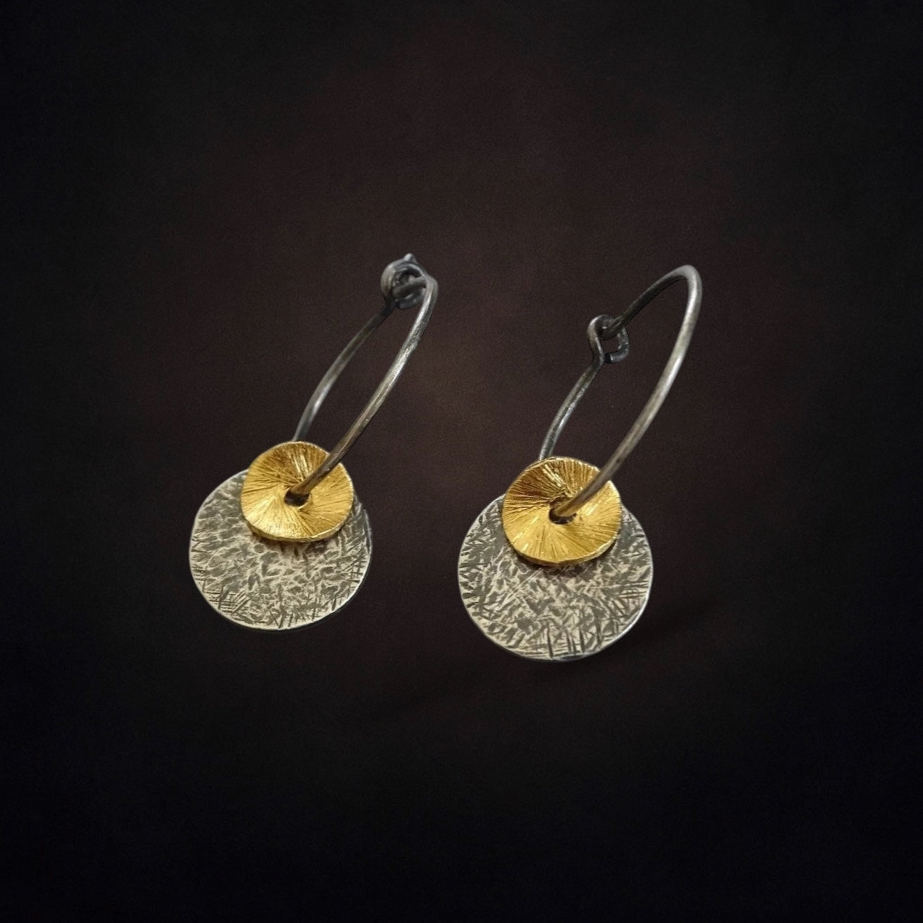 Oxidised sterling silver disc earrings.
