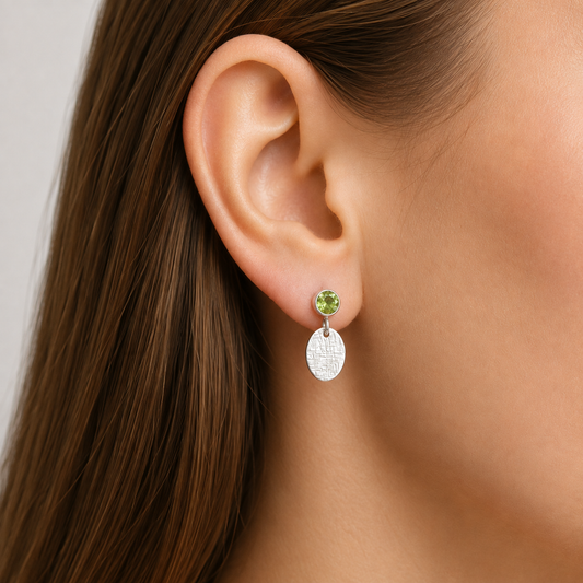Peridot sterling silver stud earrings.