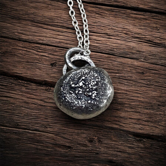 Oxidised sterling silver pebble necklace.