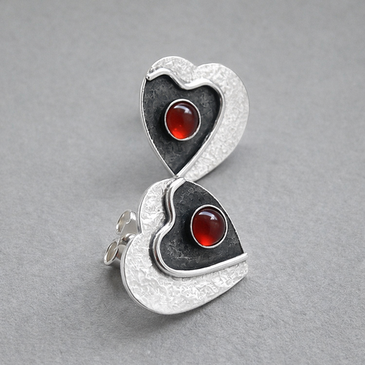 Carnelian sterling silver heart stud earrings.