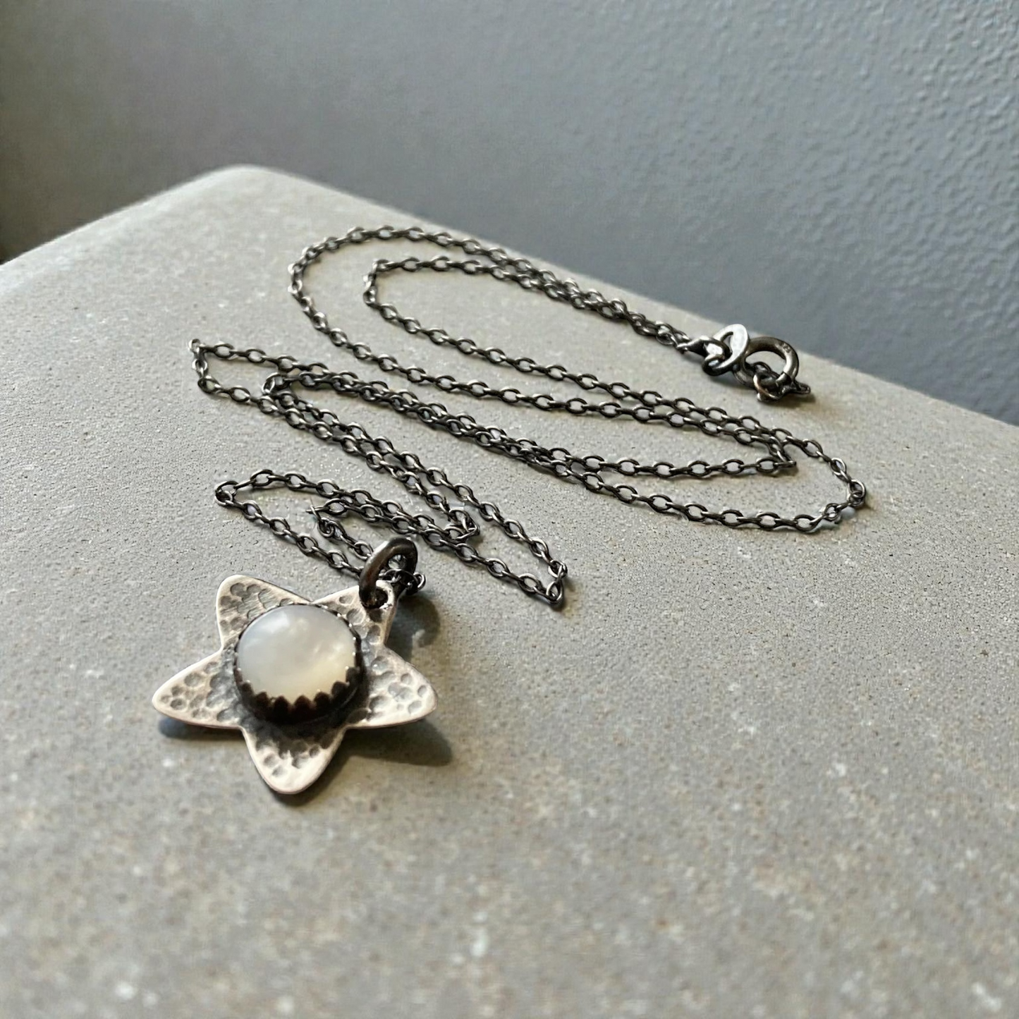 Mother of Pearl, star oxidised sterling silver necklace.