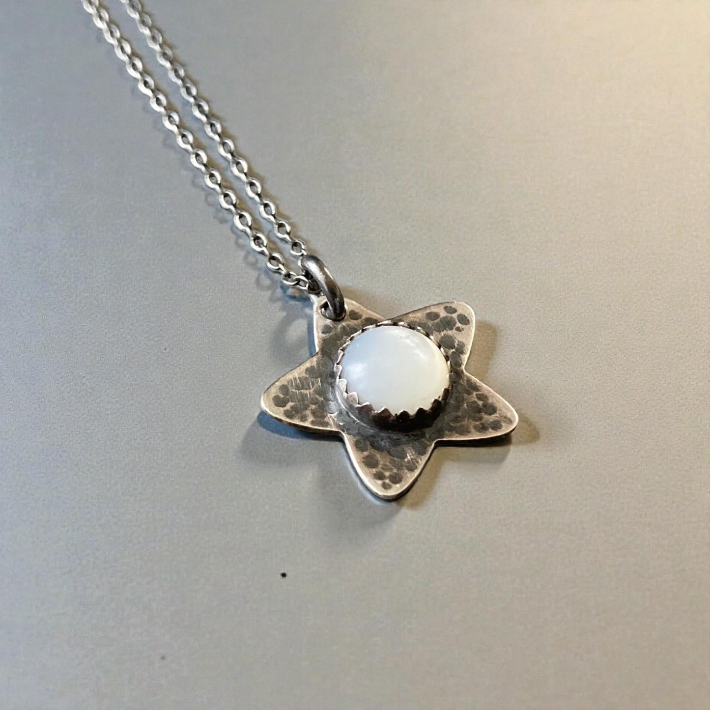 Mother of Pearl, star oxidised sterling silver necklace.