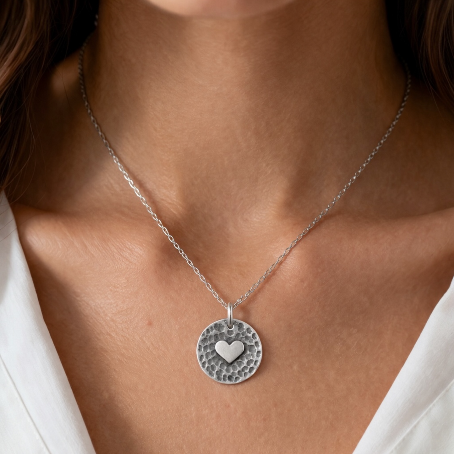 Sterling silver heart disc pendant