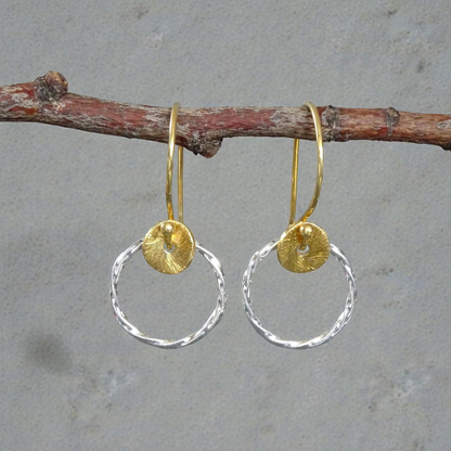 Sterling silver twisted circle earrings.