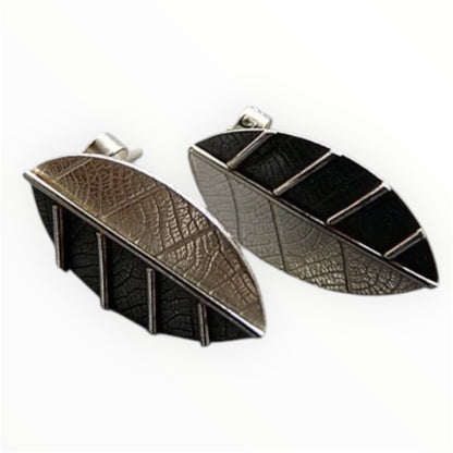 Sterling silver leaf stud earrings.