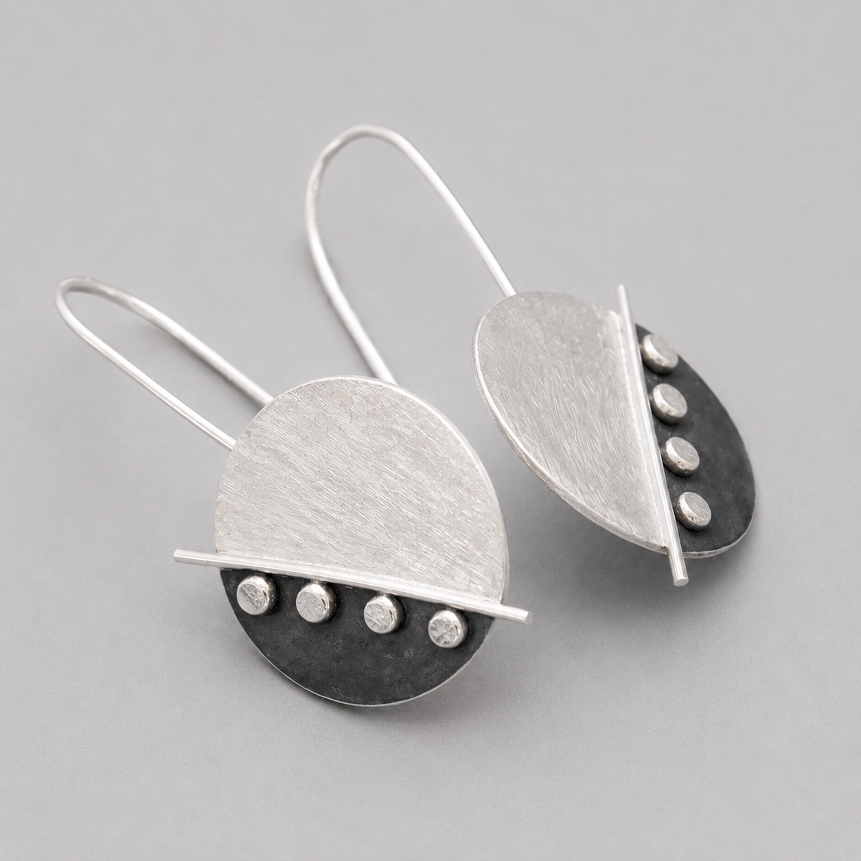 Large sterling silver disc earrings.