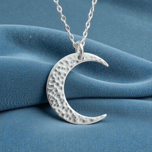 Crescent moon sterling silver necklace.