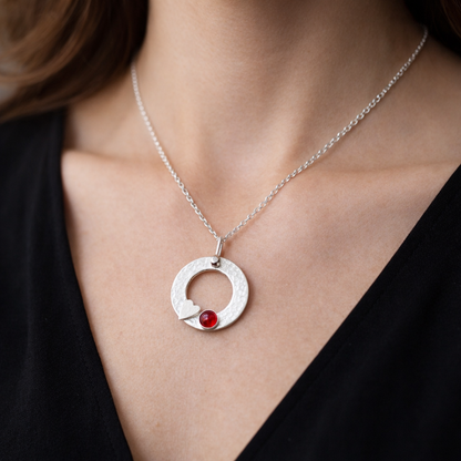 Sterling silver garnet circle necklace