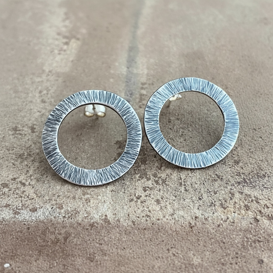 Large oxidised sterling silver hammered circle stud earrings.