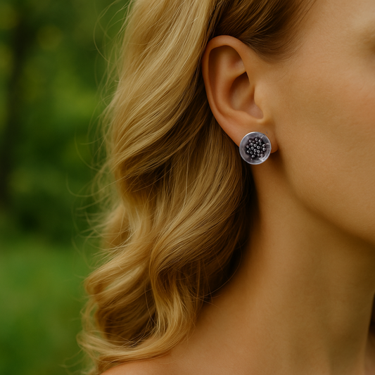 Sterling silver bowl stud earrings.